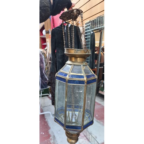 380 - A fab pair of hanging lantern style light fixtures made of brass and bevelled clear glass panels, al... 