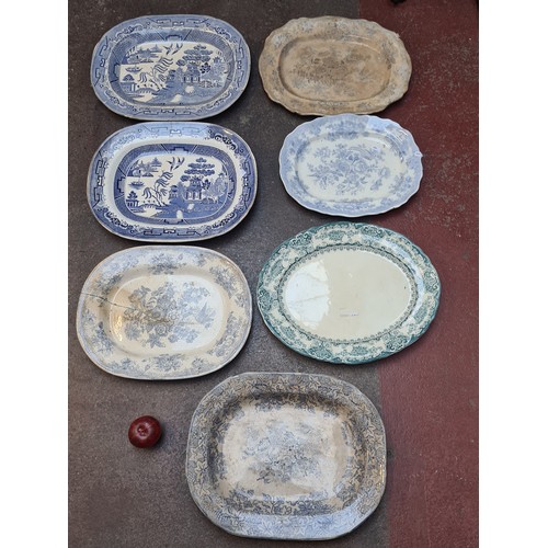 383 - Six antique blue and white serving / meat platters.