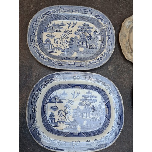 383 - Six antique blue and white serving / meat platters.