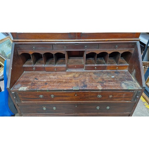 984 - Star lot ;An antique writing desk with added display glass cabinet, features four drawers and writin... 