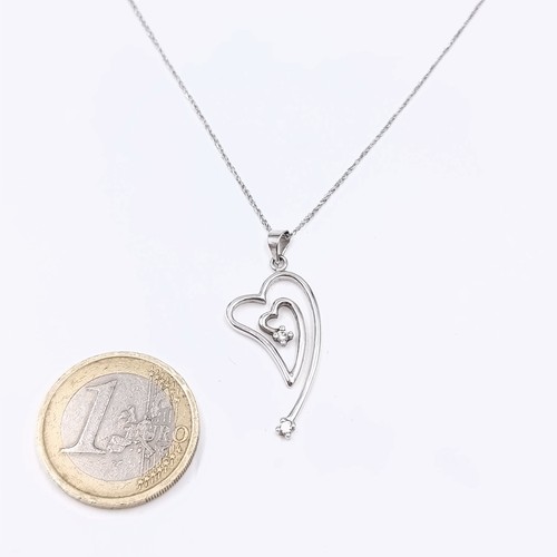 1099 - Star lot : A very pretty 9ct white gold and diamond pendent necklace. chain length 40cm 2.9 grams