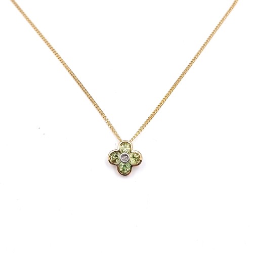 2 - A nine carat gold peridot gemstone pendant and chain.  Length of chain - 40 cms. Total weight - 2.41... 