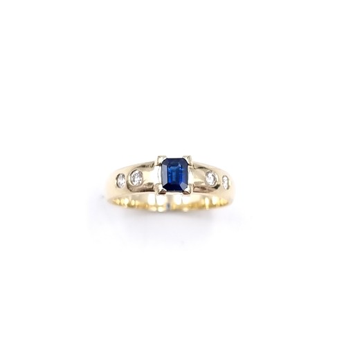 5 - Star Lot : A  super 14 carat gold diamond and sapphire ring. Ring size - L 1/2. Weight - 3.28 grams.