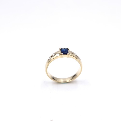 5 - Star Lot : A  super 14 carat gold diamond and sapphire ring. Ring size - L 1/2. Weight - 3.28 grams.