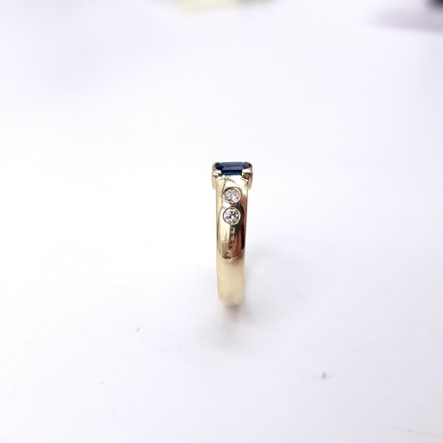 5 - Star Lot : A  super 14 carat gold diamond and sapphire ring. Ring size - L 1/2. Weight - 3.28 grams.