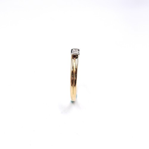 9 - An 18 carat gold diamond solitaire ring. Est weight of diamond - 0.20 carats. Size - O. Weight - 3.3... 