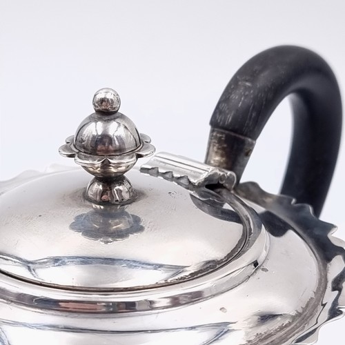 541 - Star Lot : A  super bachelor sterling silver teapot standing on four paw feet with finial mount and ... 