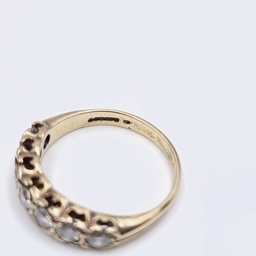 567 - Star Lot : An outstanding seven stone diamond half eternity ring set in nine carat gold. Est. weight... 