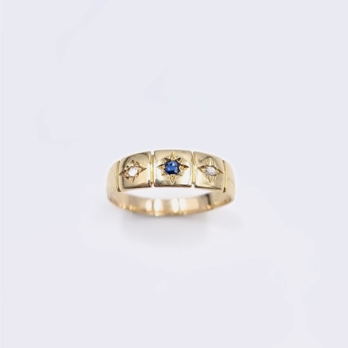 571 - Star Lot : A gypsy style 15 carat gold diamond and gem set ring. Size - P. Weight - 2.33 grams. Boxe... 