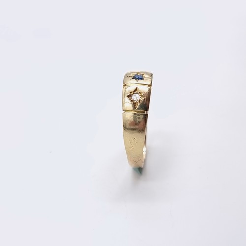 571 - Star Lot : A gypsy style 15 carat gold diamond and gem set ring. Size - P. Weight - 2.33 grams. Boxe... 