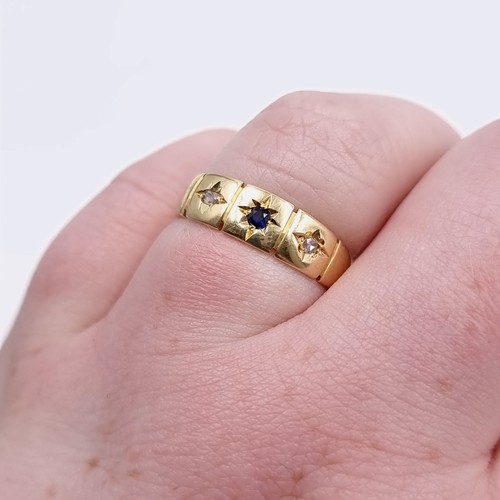 571 - Star Lot : A gypsy style 15 carat gold diamond and gem set ring. Size - P. Weight - 2.33 grams. Boxe... 