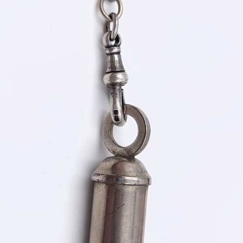 625 - An Acme Whistle with a sterling silver suspension T bar chain, With an alter sports whistle.