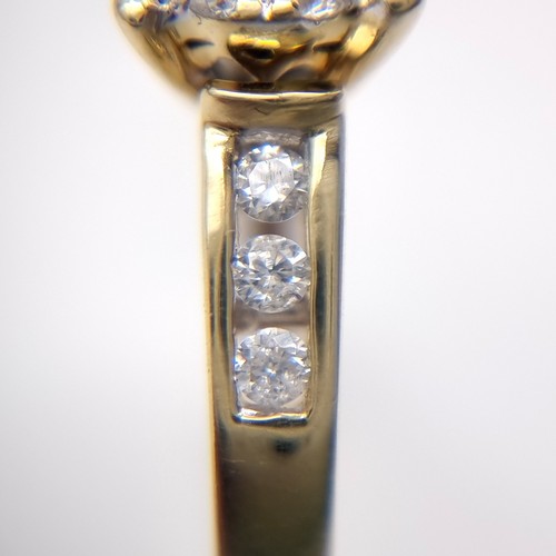 1105 - Super Star lot : A stunning 14ct yellow gold diamond ring. The centre diamond is approx 0.6cts and i... 