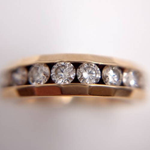 1106 - Super Star Lot : A Fabulous 14ct yellow gold channel set diamond ring, With 9 good size large inset ... 