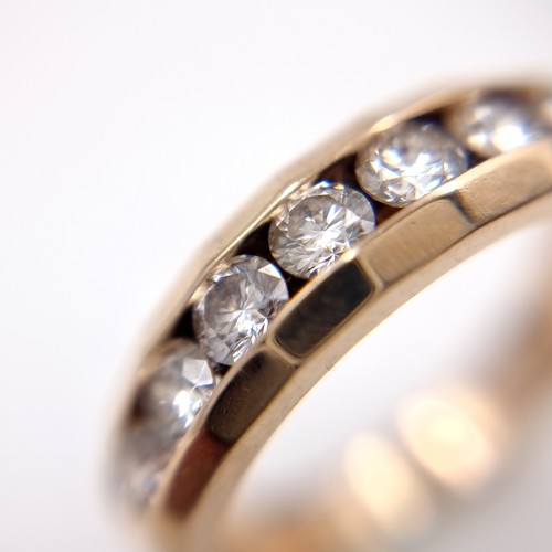 1106 - Super Star Lot : A Fabulous 14ct yellow gold channel set diamond ring, With 9 good size large inset ... 