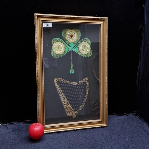 A good vintage Irish Themed quartz clock, with Harp and shamrock imagery