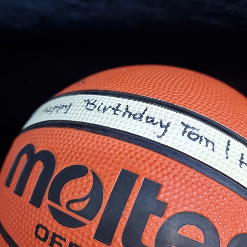 147 - Two signed sporting goods including a Molten basketball and a Regent American football with laces. T... 