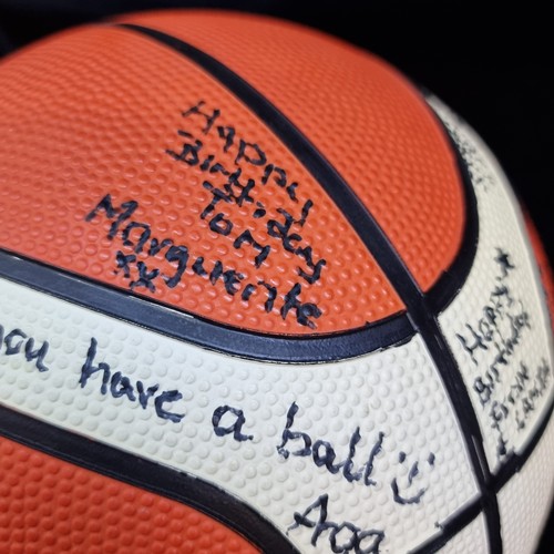 147 - Two signed sporting goods including a Molten basketball and a Regent American football with laces. T... 