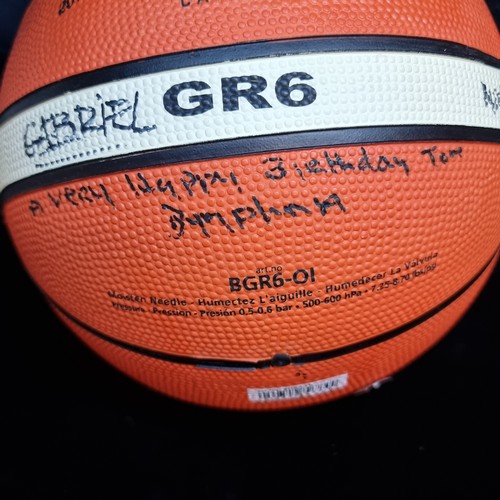 147 - Two signed sporting goods including a Molten basketball and a Regent American football with laces. T... 