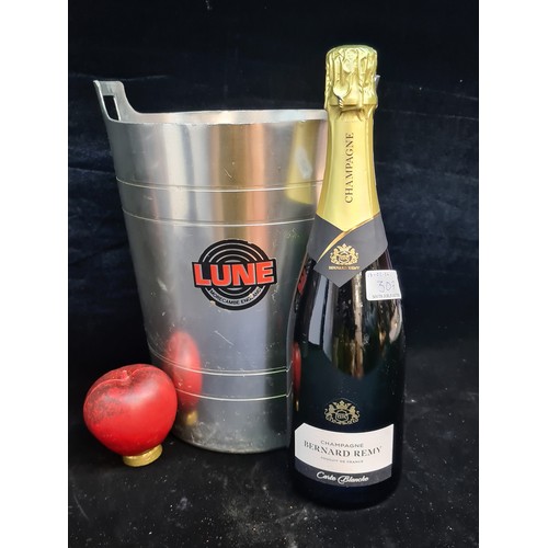 307 - A sealed 75cl of Bernard Remy Champagne Brut Carte Blanche, paired with a rare Lune Morecambe Englan... 