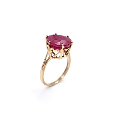 1 - Star Lot : A large ruby gemstone ring set in nine carat gold. Size - J 1/2. Weight - 3.38 grams. Box... 