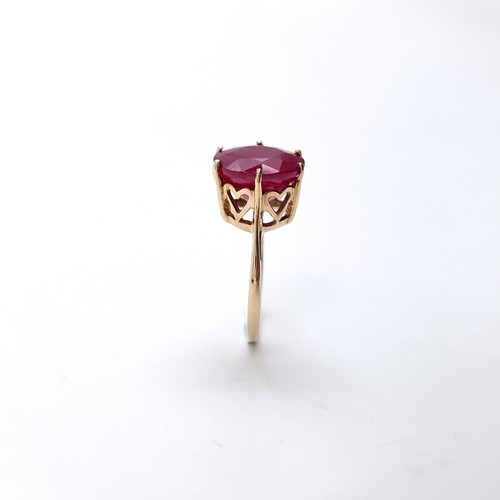 1 - Star Lot : A large ruby gemstone ring set in nine carat gold. Size - J 1/2. Weight - 3.38 grams. Box... 