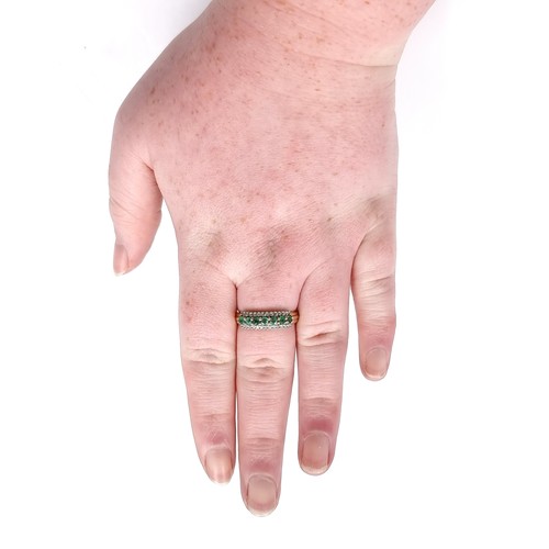 6 - Star Lot : A fine emerald & diamond half eternity ring set in nine carat gold. Ring size - R. Weight... 