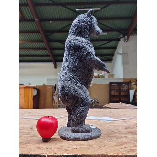 417 - A large Standing bear figurine, detailed with realistic texture.