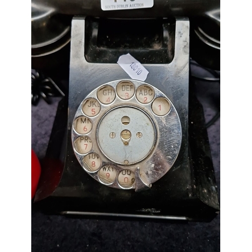 440 - Two vintage rotary dial telephones including a Bakelite example.