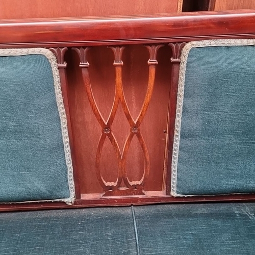 495 - Star Lot : A early 20th Century mahogany settee with pierced splat back, upholstered in deep teal fa... 