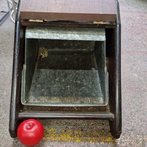 678 - Victorian mahogany coal scuttle with brass handle and fittings, featuring a hinged lid and removable... 