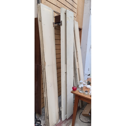 373 - Two bi fold pairs of Georgian window shutters. MM: 55cm x 204cm.