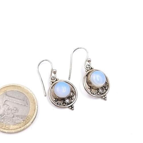 A pair of pretty sterling silver moonstone drop pendant earrings - suitable for pierced ears. Total weight - 3.6 grams. Boxed.