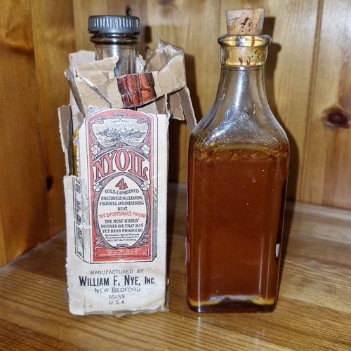 Antique bottle duo includes a William F. Nye NYOIL Whale oil with ...