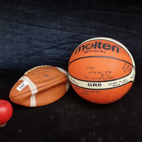 1382 - Two signed sporting goods including a Molten basketball and a Regent American football with laces. T... 