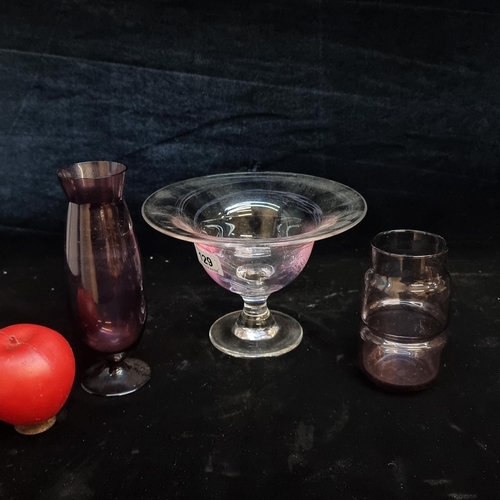 1385 - Three pieces of amethyst glass including two vases and a pedestal bowl. (Bowl looks like Jerpoint )
... 