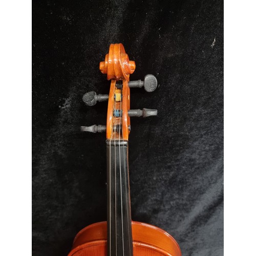 123 - Star Lot : A Skylark 4/4 violin, bow and case. In good condition. Also includes box of Rosin.