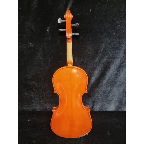 123 - Star Lot : A Skylark 4/4 violin, bow and case. In good condition. Also includes box of Rosin.