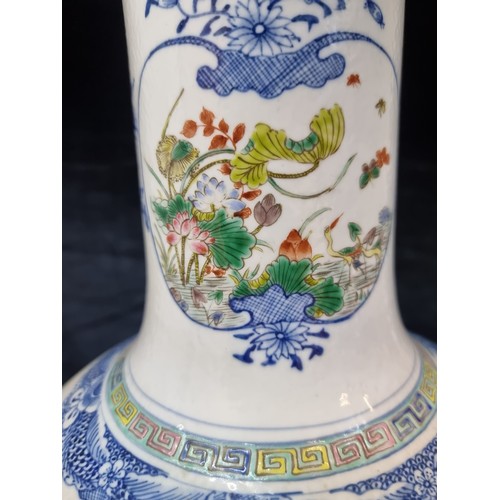 147 - Star Lot : A very large antique Chinese vase in a Famile Rose pattern. Wonderful hand painted design... 