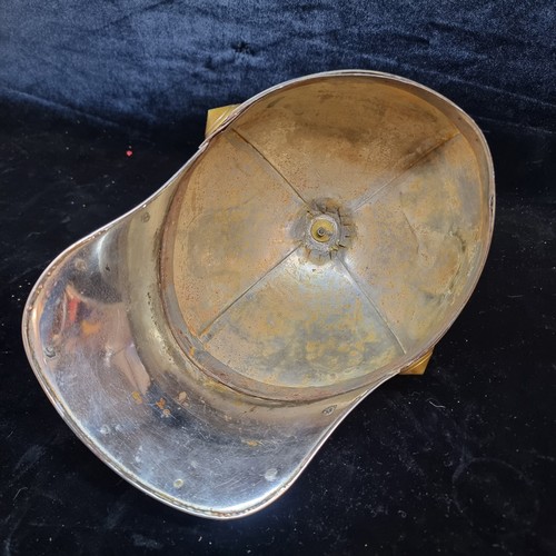 150 - An antique  style 1885 Odd Fellows spiked fraternal lodge helmet with neck protection.