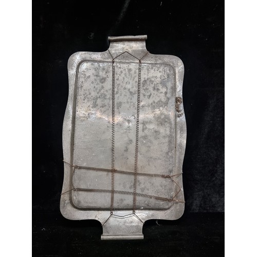 247 - A Large  Arts and Crafts hand hammered pewter tray.