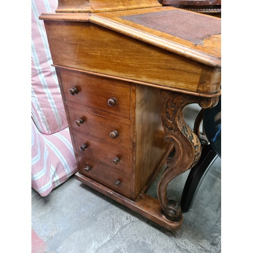 639 - Star Lot : Victorian walnut Davenport desk, 19th century, features a tooled leather writing surface,... 