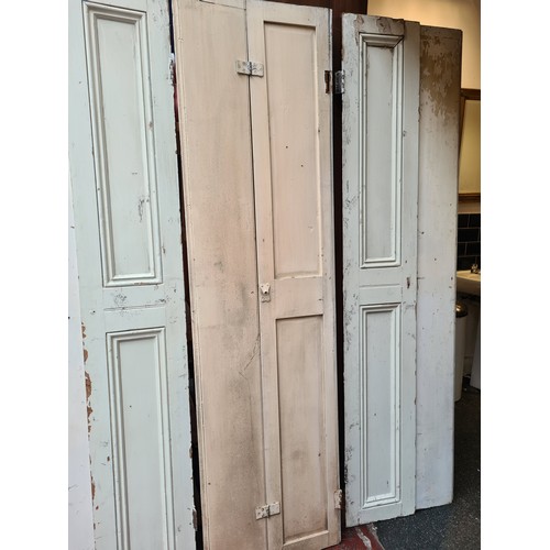 373 - Two bi fold pairs of Georgian window shutters. MM: 55cm x 204cm.