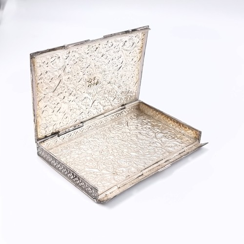 8 - A most attractive hinged business card holder with repousse design. Dimensions: 10 x 6.5 cms. Weight... 