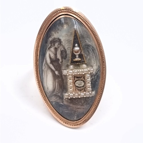 14 - Star lot : A very unusual antique nine carat gold elliptical shaped Georgian mourning ring with mark... 