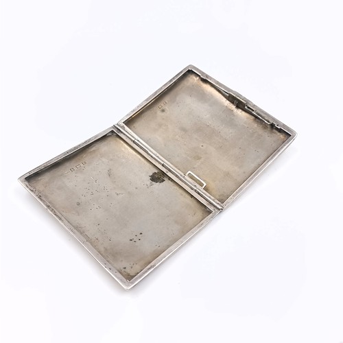 527 - A sterling silver cigarette/business card holder hallmarked Birmingham with initialled engine turned... 