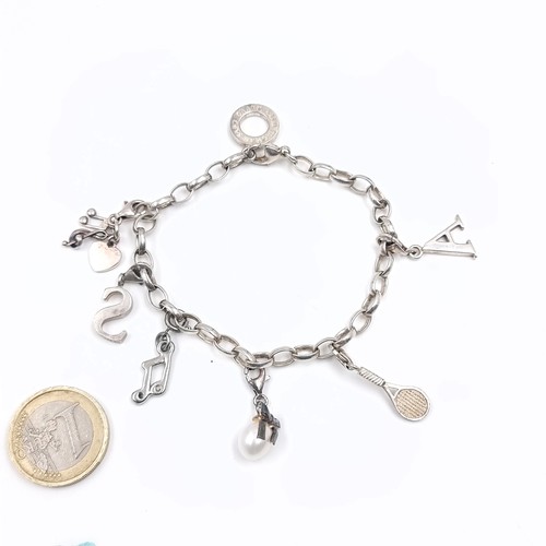 550 - A designer Thomas Sabo sterling silver charm bracelet. Complete with original box. Total weight - 18... 