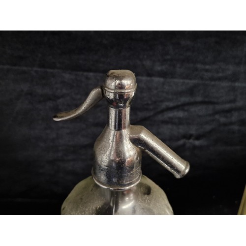 483 - Two flying harp antique Irish soda siphons from the Mineral Waters Distributors Ltd Dublin. Both hea... 