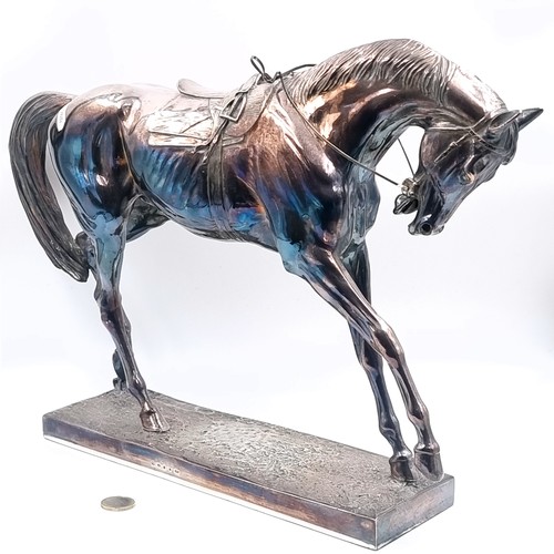 722 - Super Star Lot: An outstanding very large sterling silver horse on silver base figure standing on a ... 