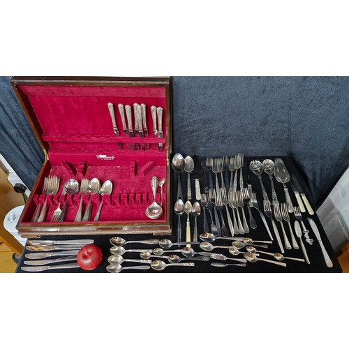 865 - A large canteen of mixed silverplate cutlery including antique Insignia art deco knives, forks and s... 